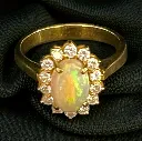 A 22-carat yellow Gold, Opal and Diamond ring