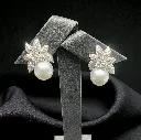 A pair of 18-carat white Gold Pearl and Diamond earrings