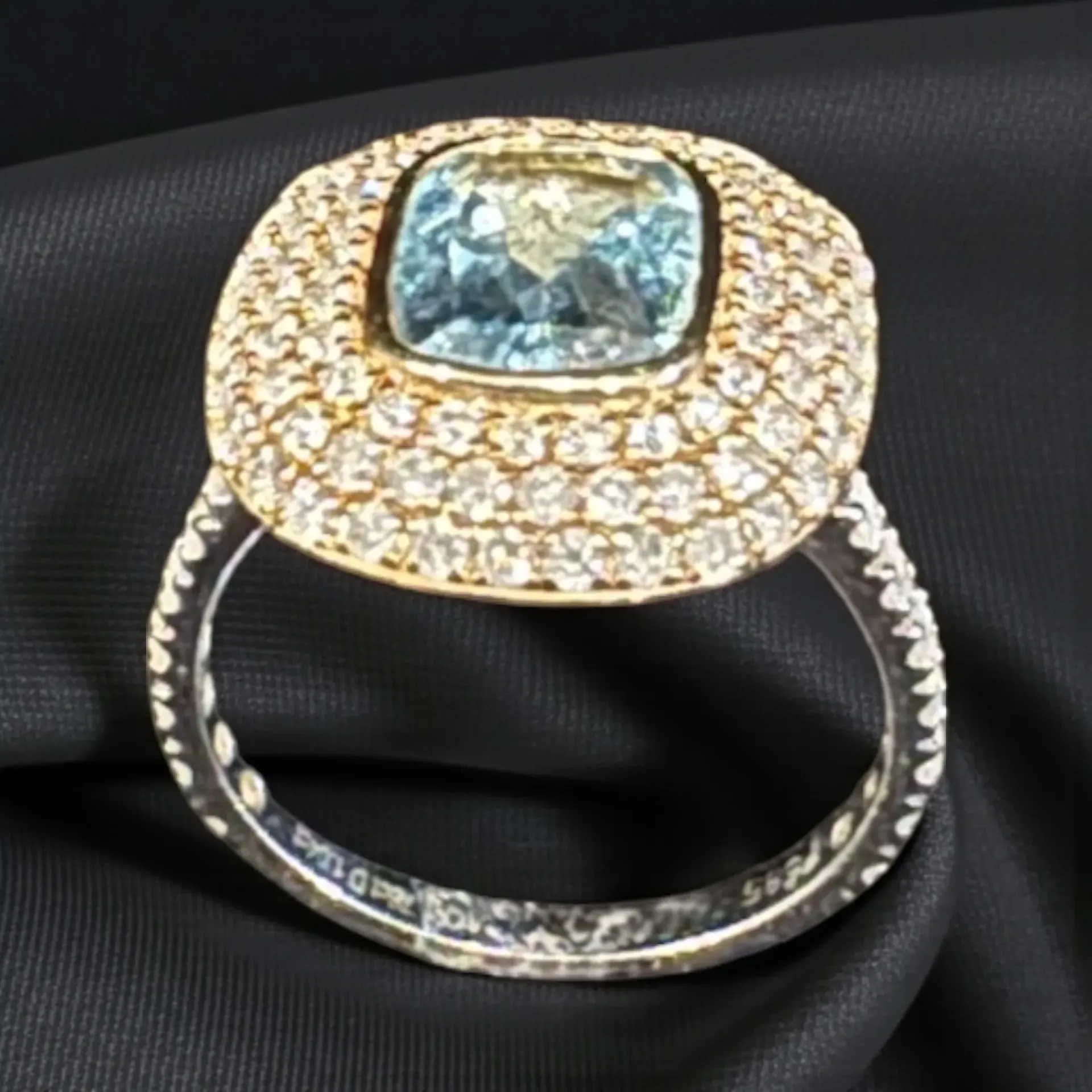 A lovely 14 Carat yellow and white Gold, Aquamarine and Diamond dress ring